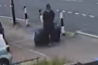 CCTV showed in court allegedly shows Ms Mitchell dragging a blue suitcase and another smaller bag on 11 June 2021