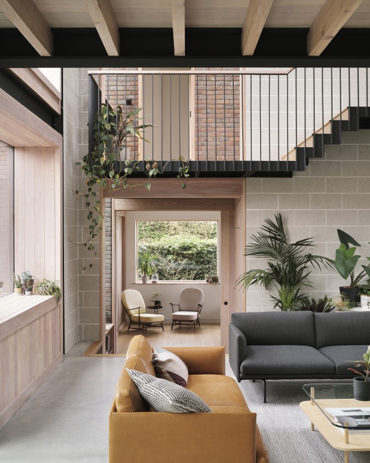 The Derwent Valley Villa, in a village in Derbyshire is made up of one building, broken up into blocks spread across the plot and connected with glass corridors