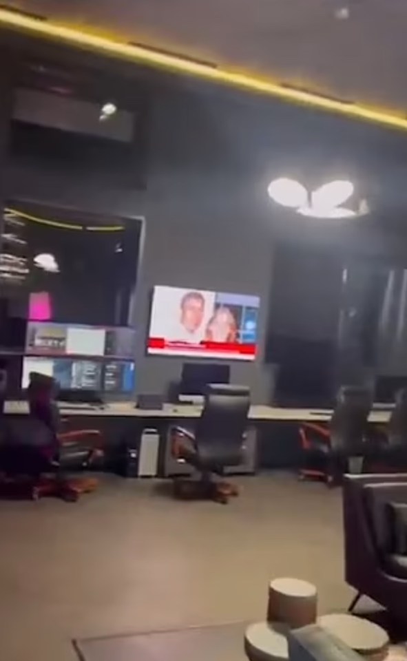 Another video from inside the compound shows an image of Prince Andrew on a screen