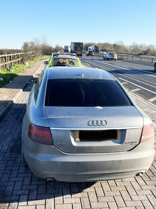 A driver was pulled over for speeding on the icy roads