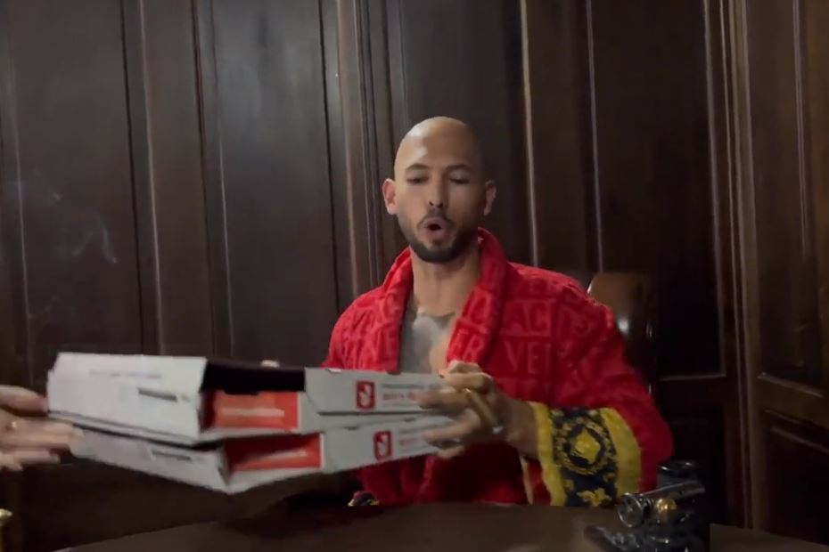 For some reason, Tate insists on being brought pizza in the video