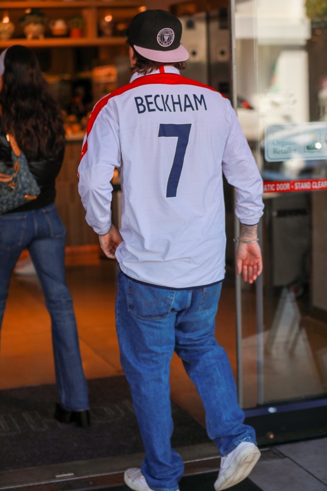 Becks' oldest son wore his dad's England No7 footie shirt