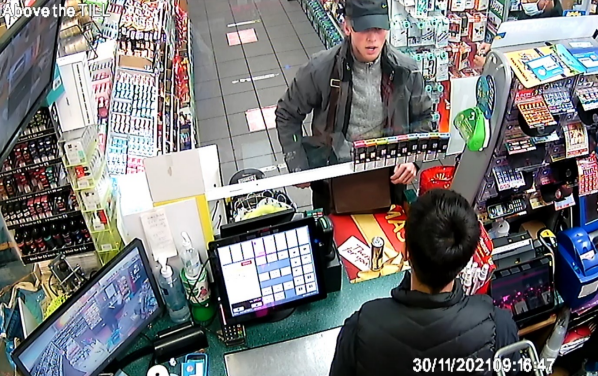 Suspect George Goddard is seen in a petrol station after the robbery