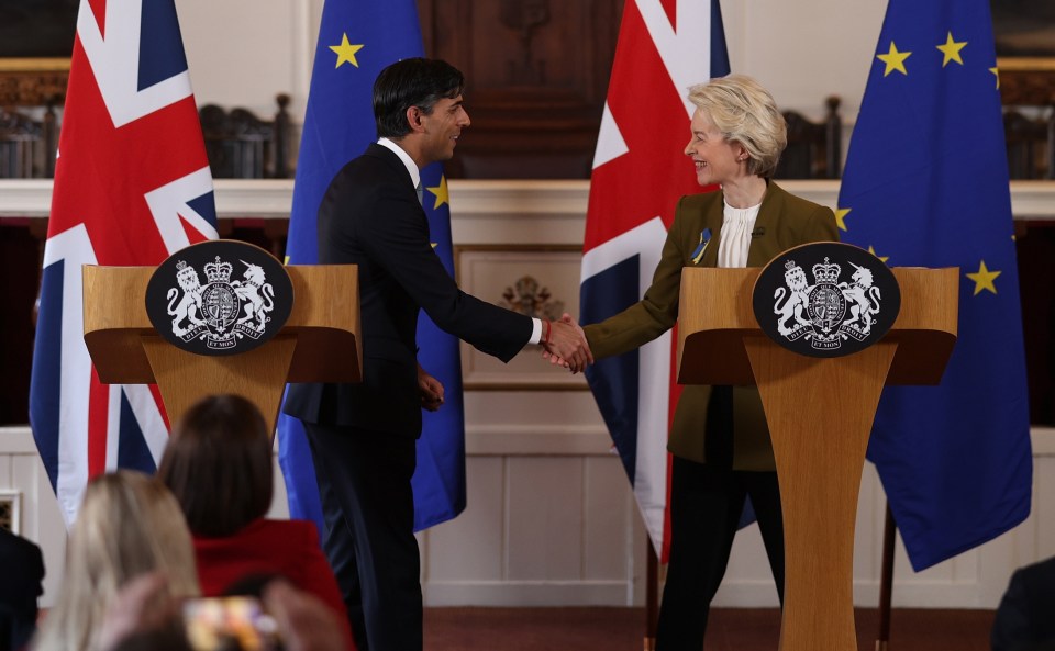 Both sides shake on the deal earlier today