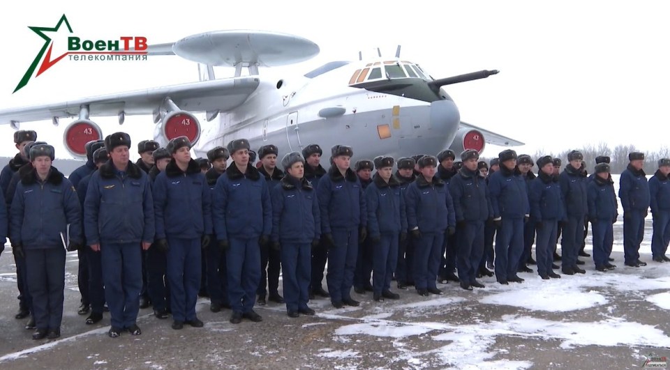 Russian airmen pictured with the jet last month at Machulishchy air base in Belarus
