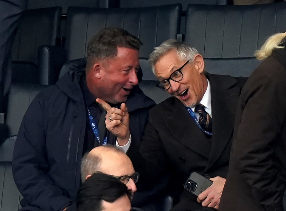 Gary joshed around in the stands with a pal