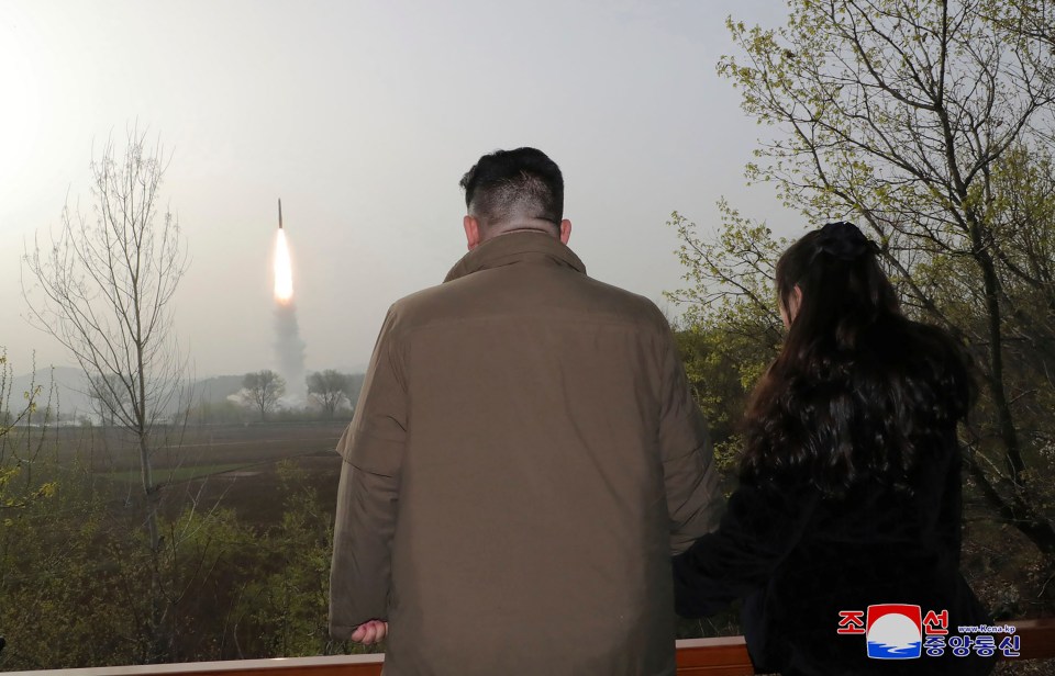 Kim Jong-un and his daughter, 10, watched as the missile fired into the air