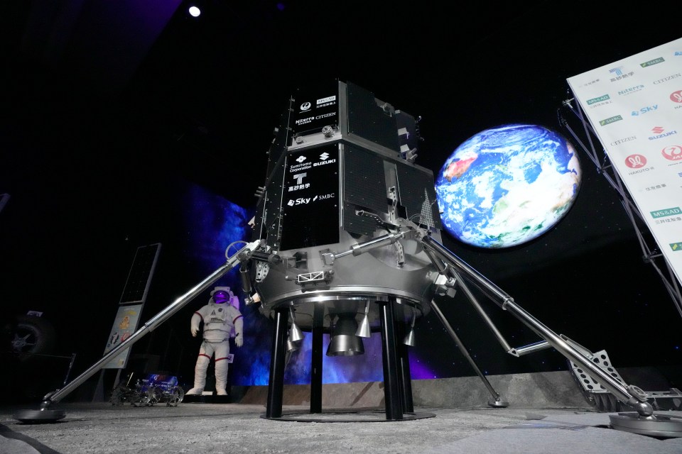 A model of the lander of Hakuto-R private lunar exploration program is displayed prior to livestream of the lunar landing event