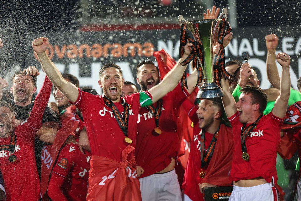 The non-league lifted the title to celebrate their return to the top