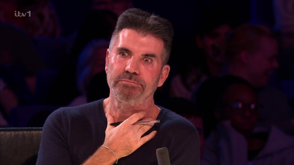 Simon also struggled to watch