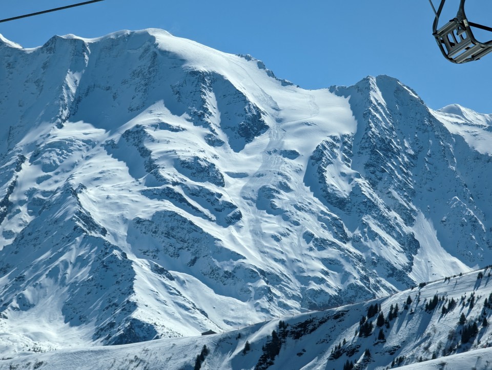 The aftermath left the slope covered in snow, burying skiers alive