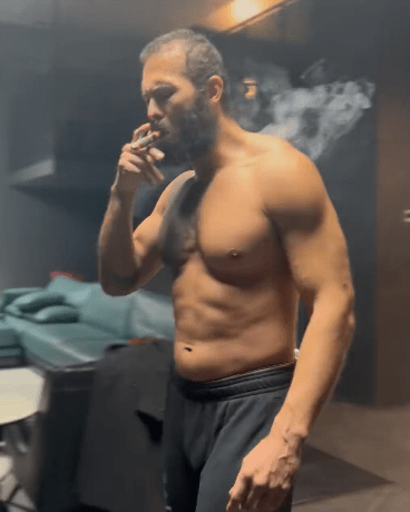 Tate posted a video of himself smoking a cigar as he returned home from prison