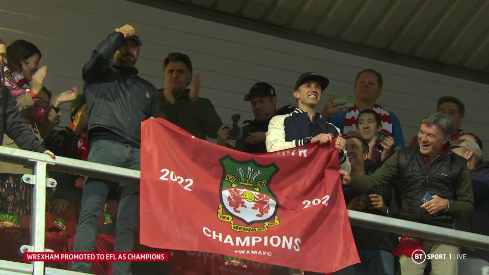 Reynolds and McElhenney unfurled a Wrexham banner