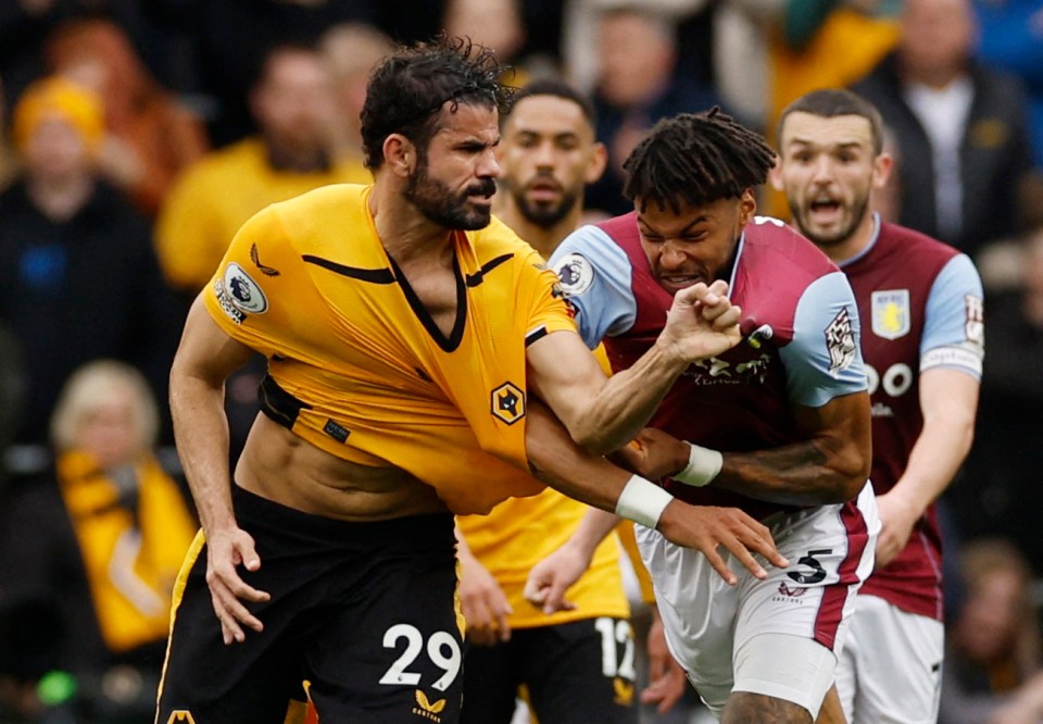 Both players were seen with a handful of the other's shirt