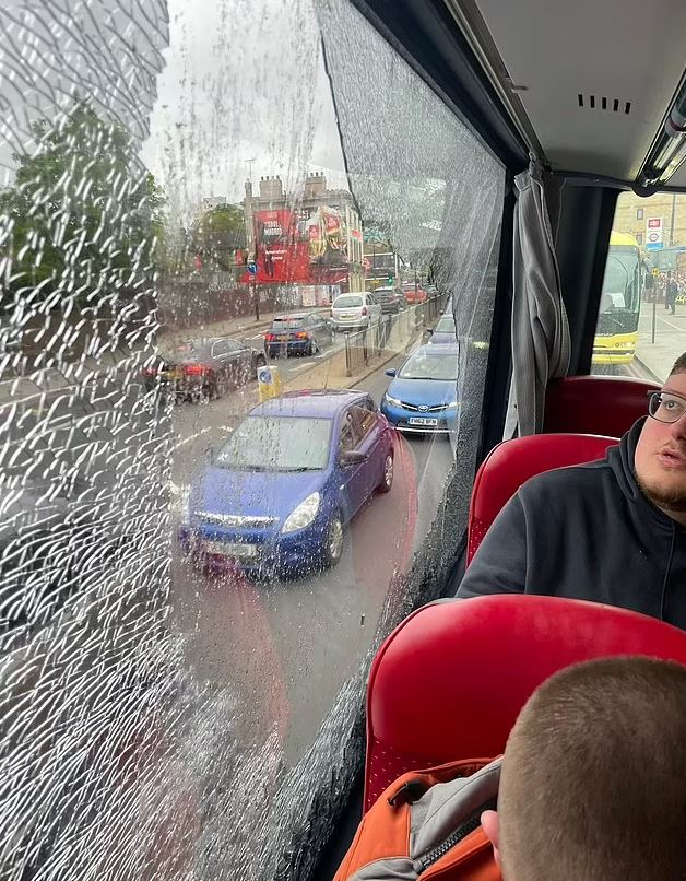 Thugs smashed windows on Blackburn Rovers' supporters' coach following Millwall's 3-4 defeat