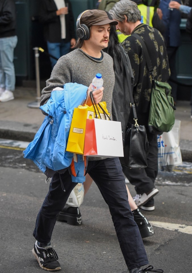 He looked unrecognisable as he spent a day shopping in London