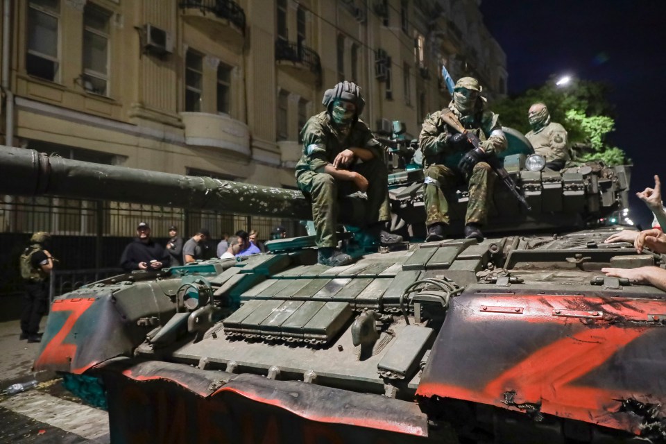 Soldiers posed as they prepared to pull out of Rostov