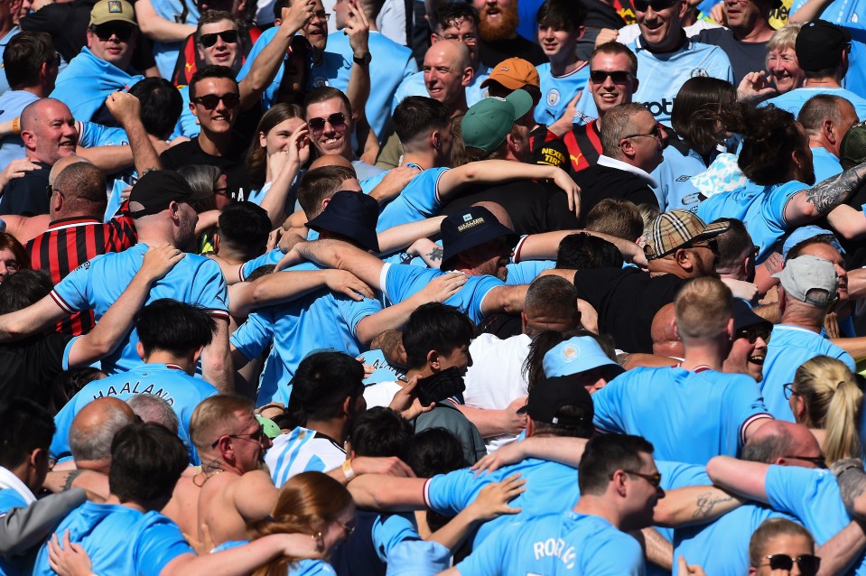 epa10643875 Manchester City's fans do the Poznan sporting celebration during the English Premier League soccer match between Manchester City and Chelsea at the Etihad in Manchester, Britain, 21 May 2023. EPA/Peter Powell EDITORIAL USE ONLY. No use with unauthorized audio, video, data, fixture lists, club/league logos or 'live' services. Online in-match use limited to 120 images, no video emulation. No use in betting, games or single club/league/player publications