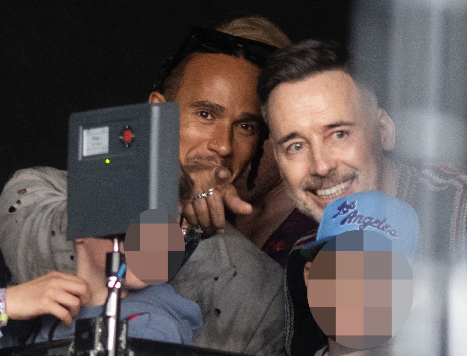 Hamilton joined Elton's husband and family to witness the stunning headline act