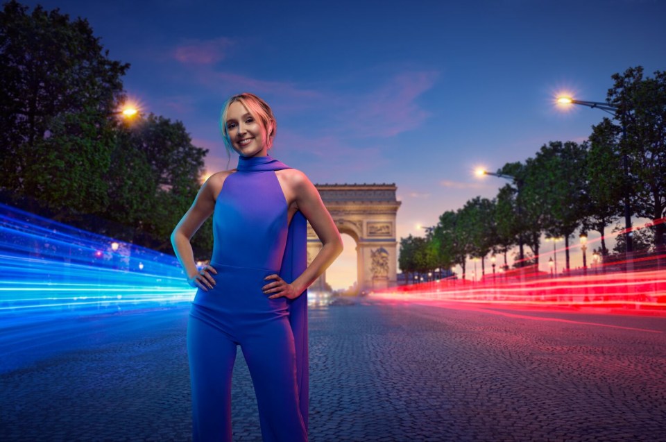 a woman in a blue dress stands in front of the triumphal arch