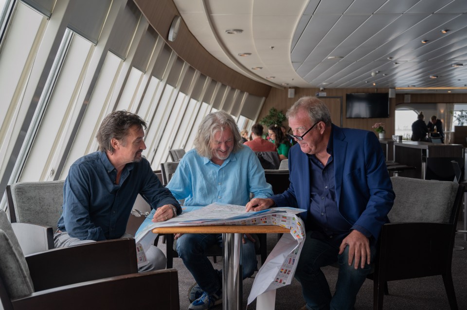 Richard, James and Jeremy looking at their route