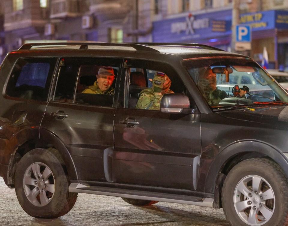 Prigozhin was ferried around in the back of a black 4x4