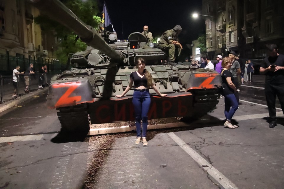 Locals posed for pictures with the Wagner Group's tanks