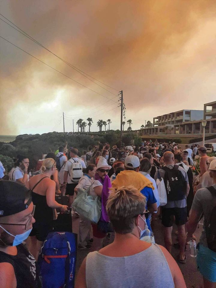 Thousands of Brit tourists were terrified and stranded in Rhodes as wildfires threatened to engulf the island