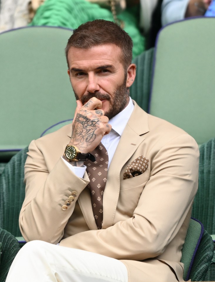 Other fashion followers couldn't help but admire David Beckham's sand coloured suit