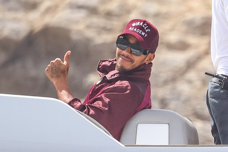 Hamilton looks relaxed despite rumours of a possible romance between Shakira and NBA star Jimmy Butler