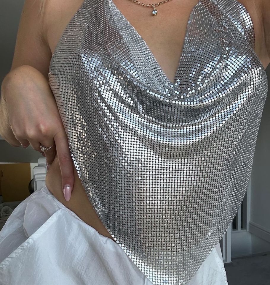 The Love Island star went braless in a glitzy top