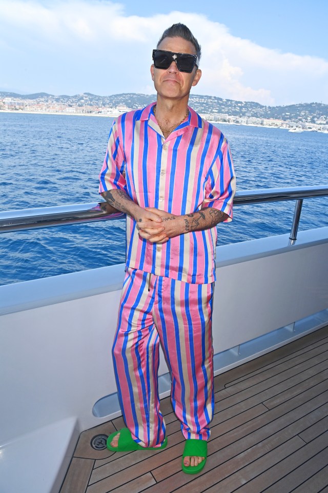 Robbie Williams says he's happier than ever as he approaches his 50th birthday