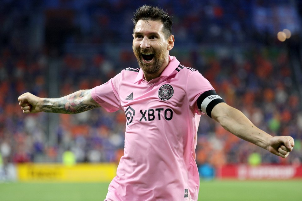 soccer player wearing a pink shirt that says xbto