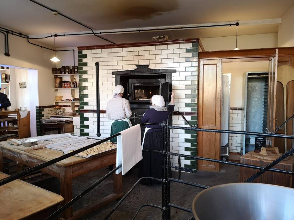 Bakers and confectioners make treats for visitors right in front of their eyes