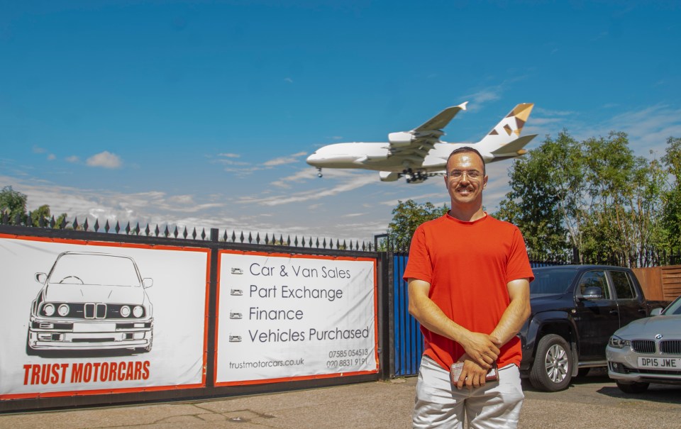 Moss Nayerri's car dealership business is just under the flight path