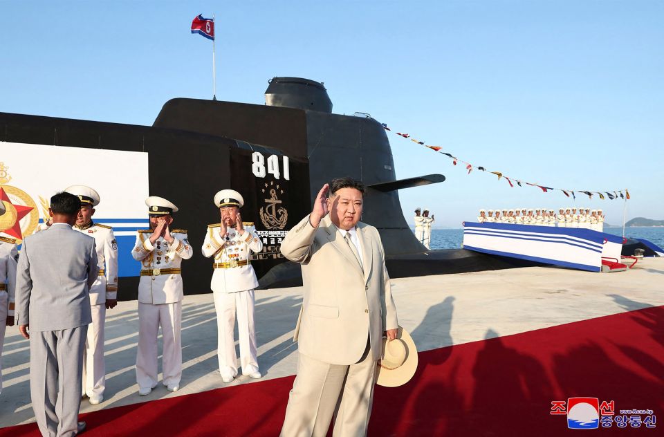 Kim was seen waving at crowds today