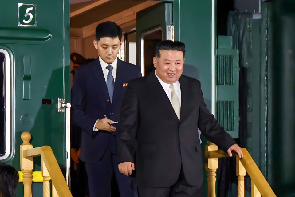 Kim Jong-un steps off his armoured train as he arrives in Russia