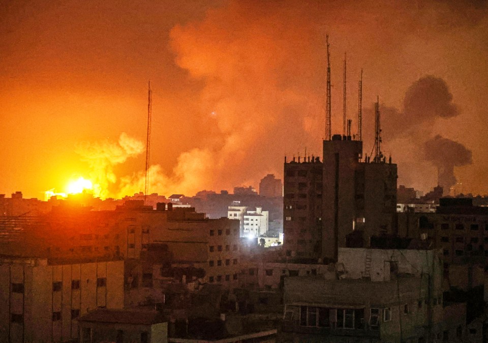 Fireballs erupt over the skyline from the Israeli airstrikes