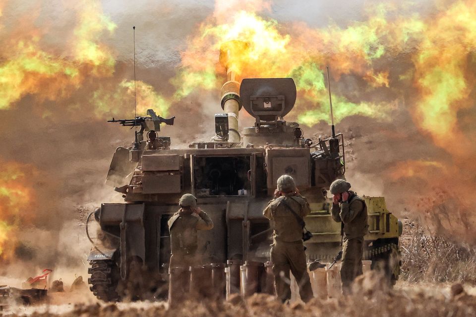 Israel forces pound artillery near the Gaza border