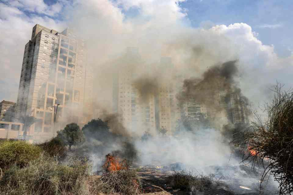 Israel has urged its citizens to take shelter as sirens blare across the country amid the barrage (Israeli city Ashkelon after a rocket attack from Hamas)