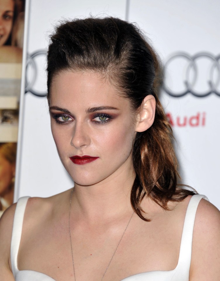 Pictured is Kristen Stewart who has a 'heavy lower lip'. Singer Taylor Swift has the world's hottest lips, according to a new survey. The star's peaked cupid's pout is the mouth women most want to copy. Angelina's luscious lips came second, followed by Rihanna, Scarlett Johansson, Rosie Huntington-Whiteley and Megan Fox.