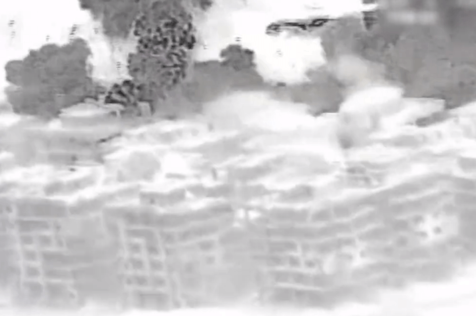 Bombs blitz buildings within the Gaza Strip in the military video
