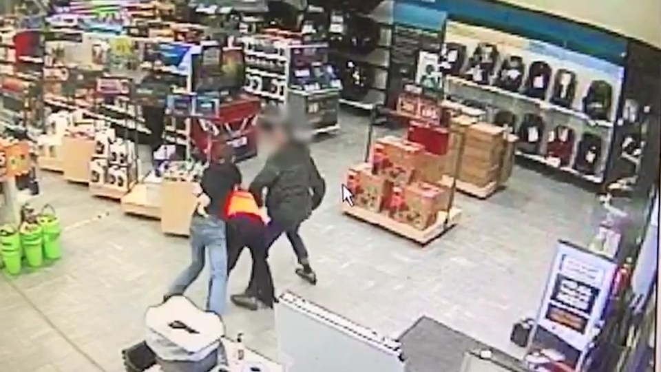 A Halfords store manager was attacked after trying to stop shoplifters last month