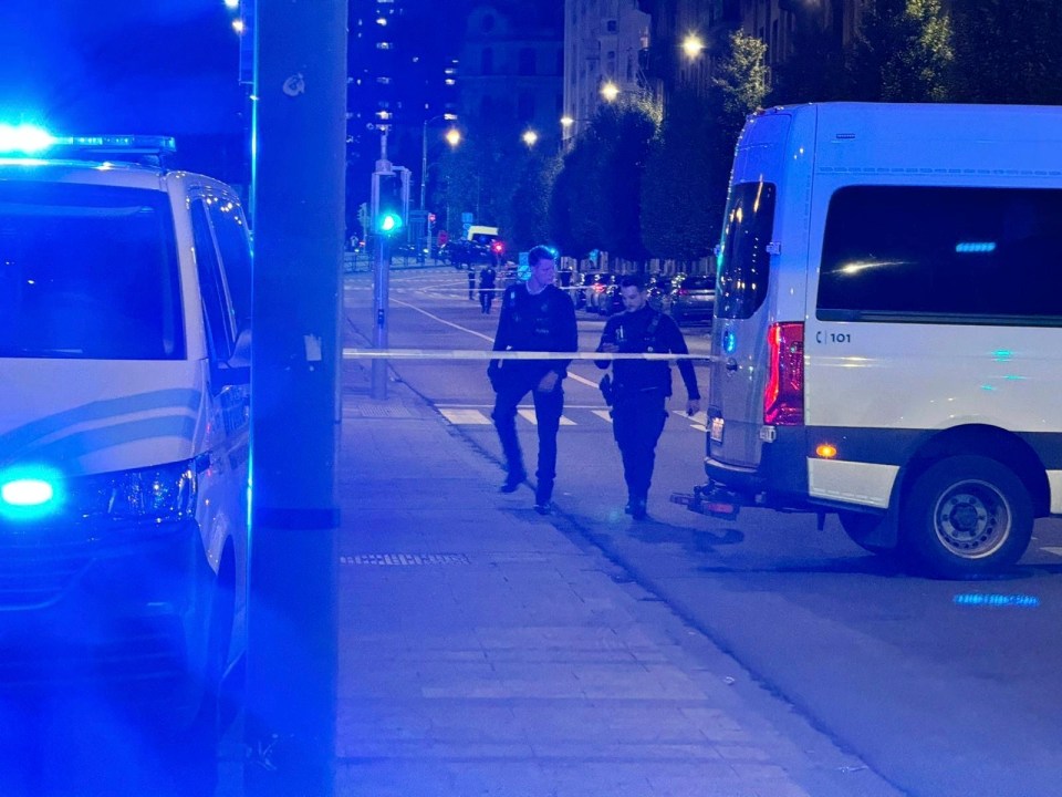 Police cordon off an area where a shooting took place in the centre of Brussels