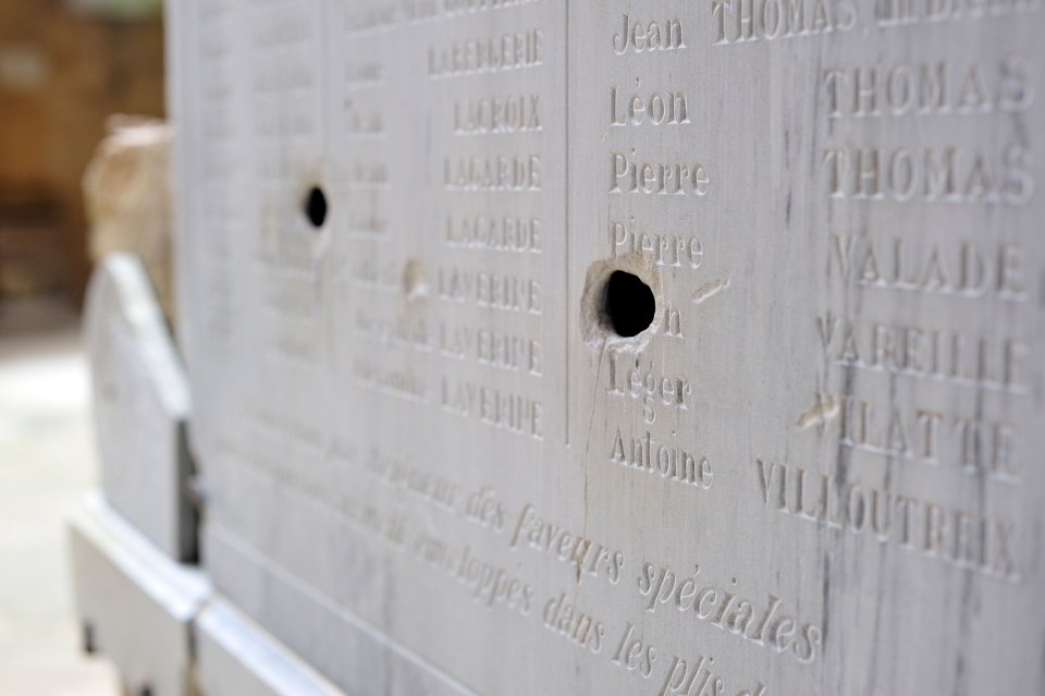 Inside the church, a memorial to locals who died in the First World War is riddled with bullet holes and shrapnel scars