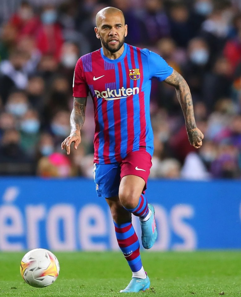 Alves of FC Barcelona runs with the ball during a match between FC Barcelona and CA Osasuna at Camp Nou in March 2022