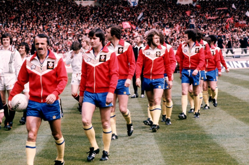 (L-R) Southampton captain Peter Rodrigues leads his team out at Wembley, followed by Jim McCalliog, Peter Osgood, Nick Holmes and Ian Turner ... Soccer - FA Cup Final - Manchester United v Southampton ... 01-05-1976 ... NULL ... NULL ... Photo credit should read: S&G/S&G and Barratts/EMPICS Sport. Unique Reference No. 409138 ... NULL
