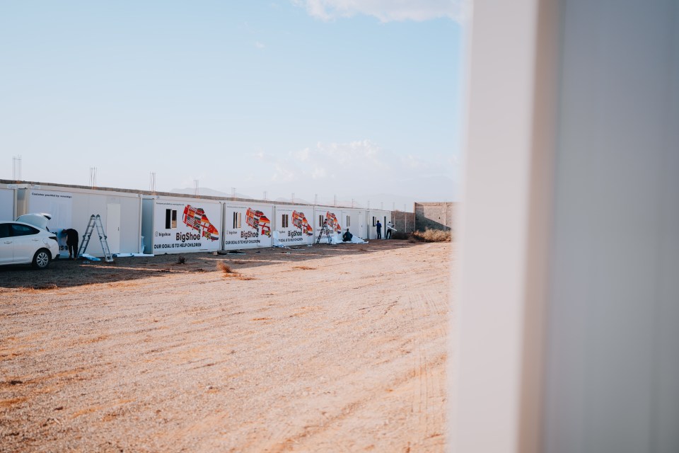 The village consists of 50 containers
