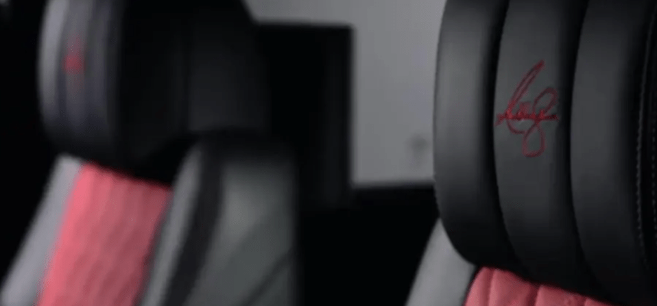 The leather seated headrests have AJ's signature on too
