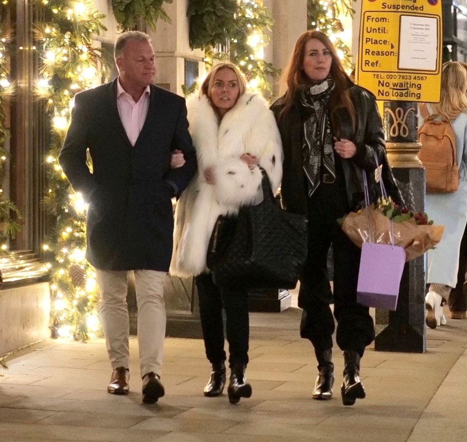 Patsy, 55, donned a huge fur-style coat as the couple went to a restaurant with their pal, stylist Angela Radcliffe